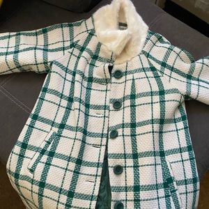 White and green coat